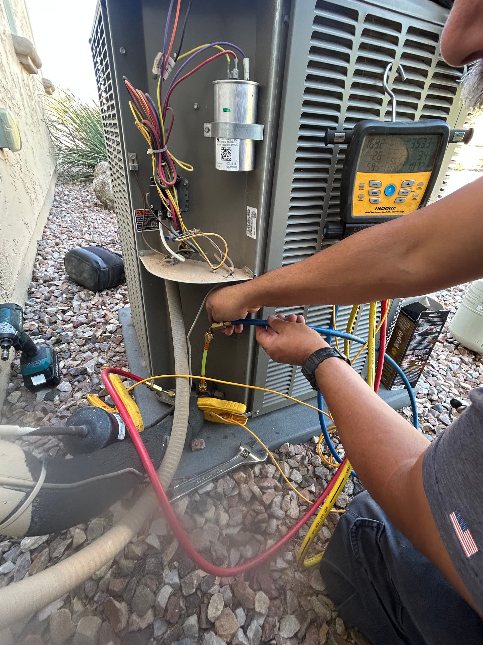 Gallery photos for AC Running But Your Home Still Feels Warm? Low Refrigerant Could Be Why: Image #1