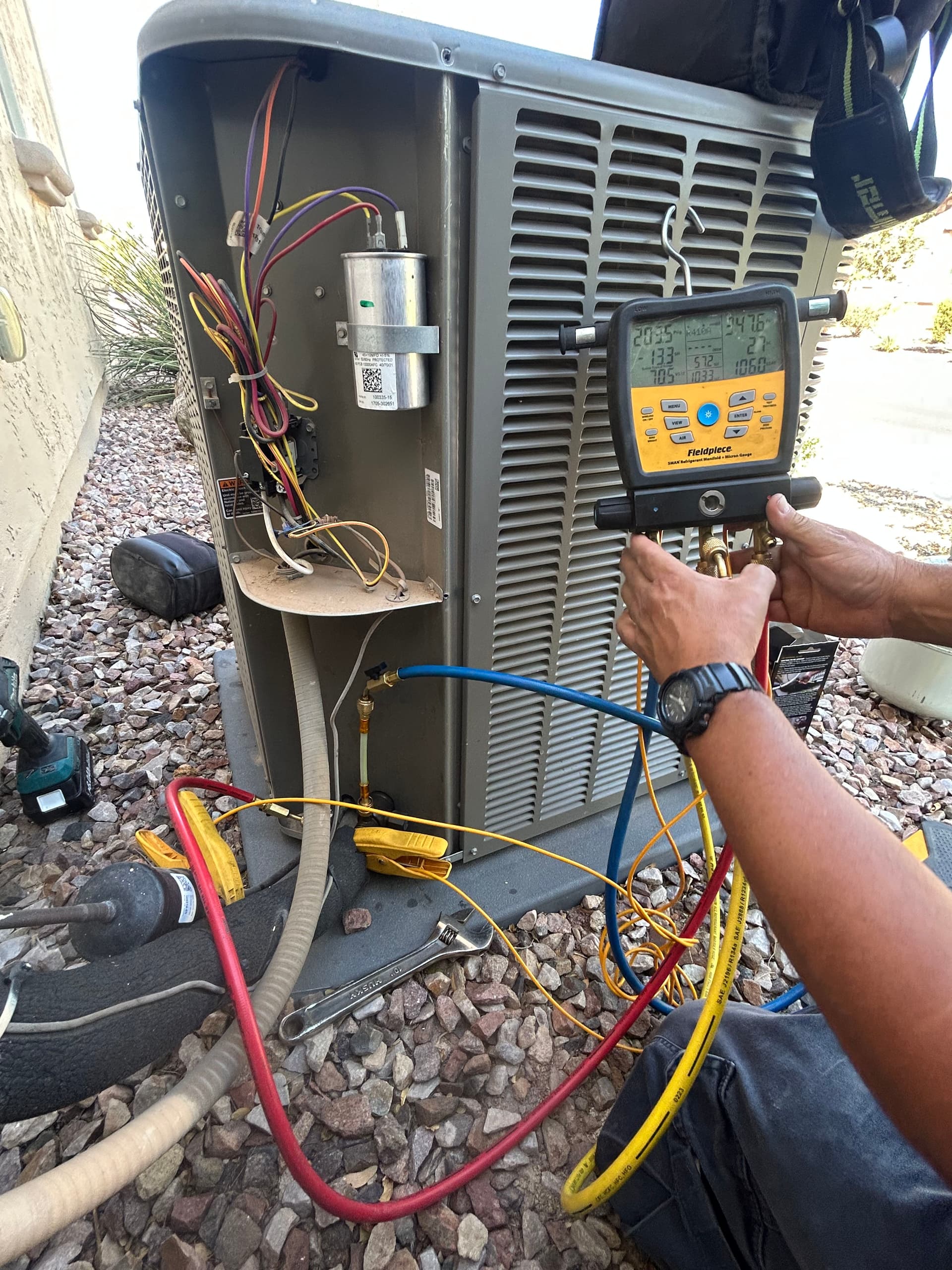 Gallery photos for AC Running But Your Home Still Feels Warm? Low Refrigerant Could Be Why: Image #2